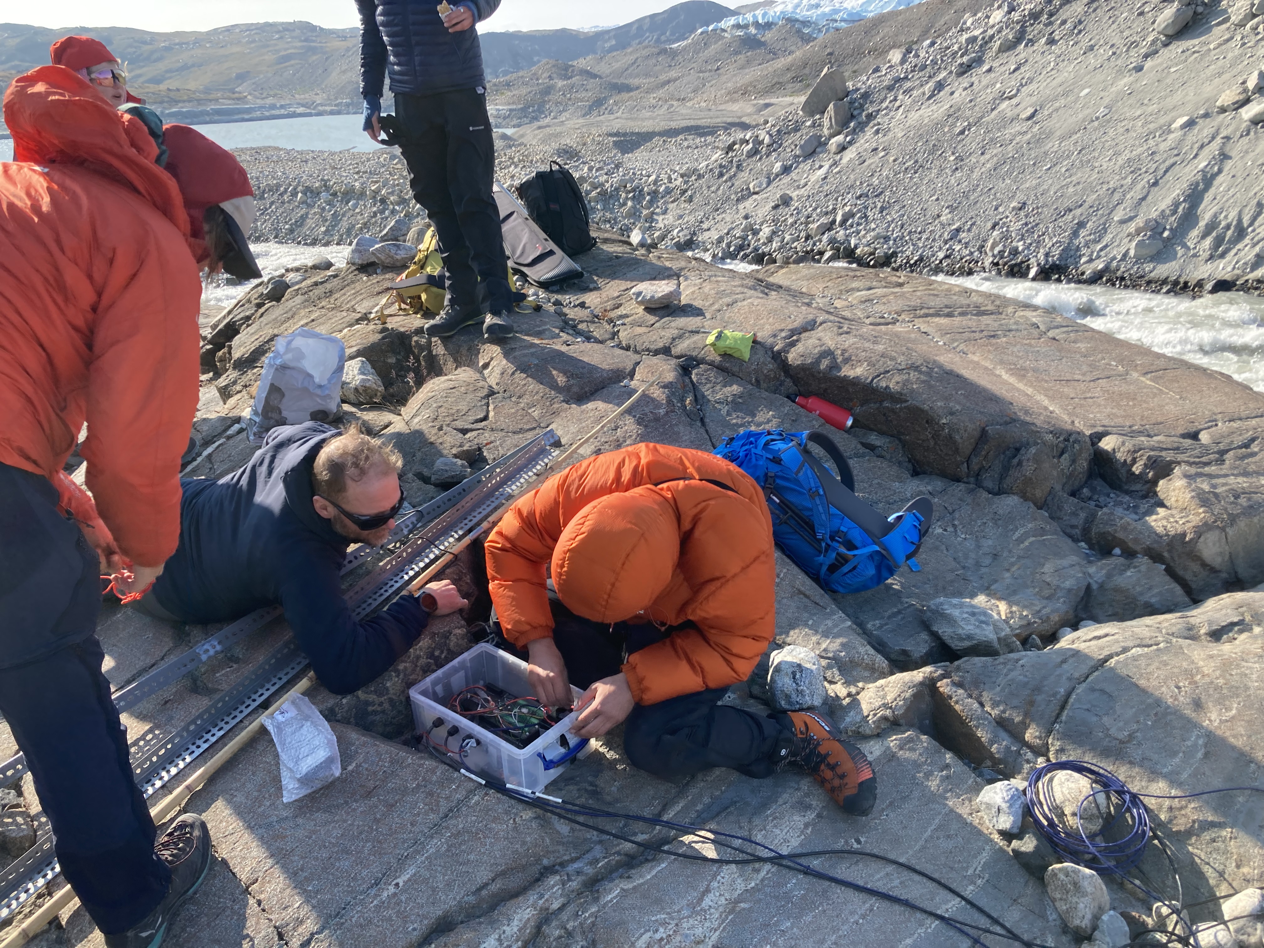 Students installing gauging station