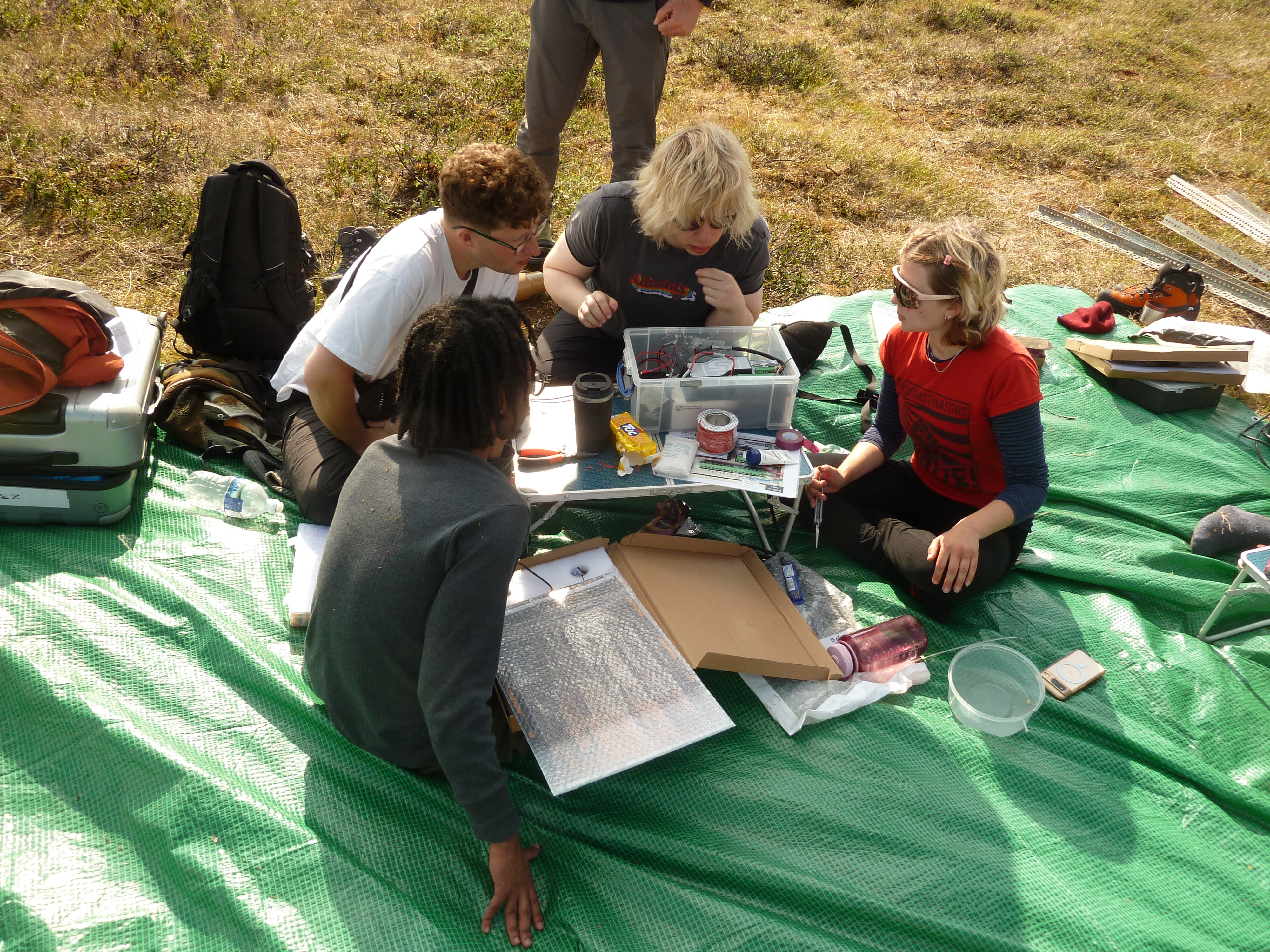 Students building gauging station
